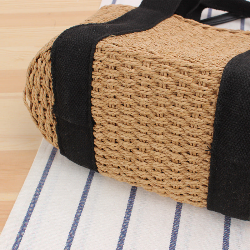 Handbag made of braided natural material with adjustable shoulder strap Bowlift