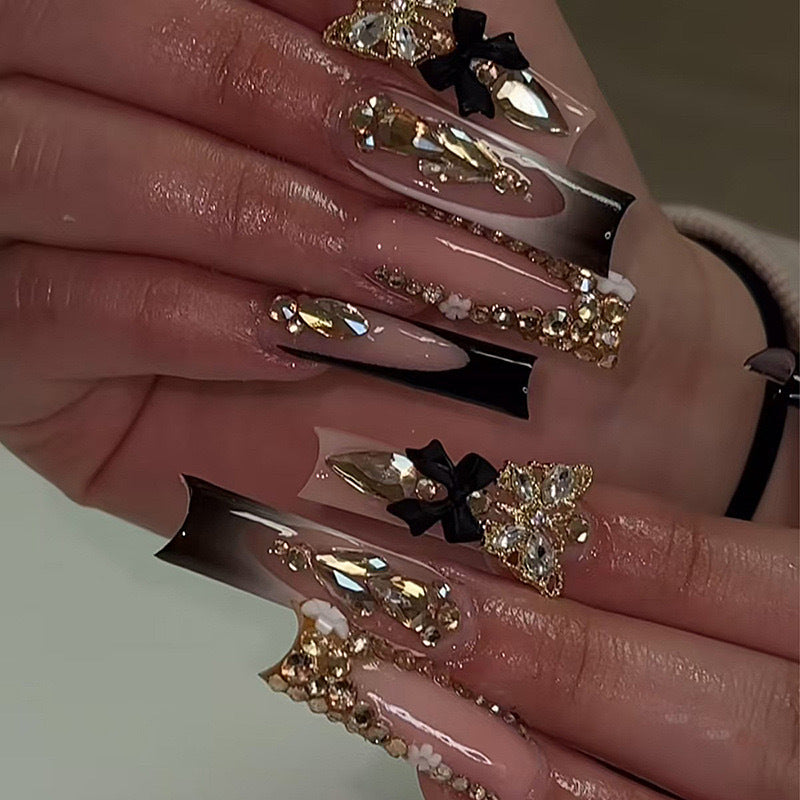 Artificial nail set with elegant 3D decorations and crystal accents Bowlift