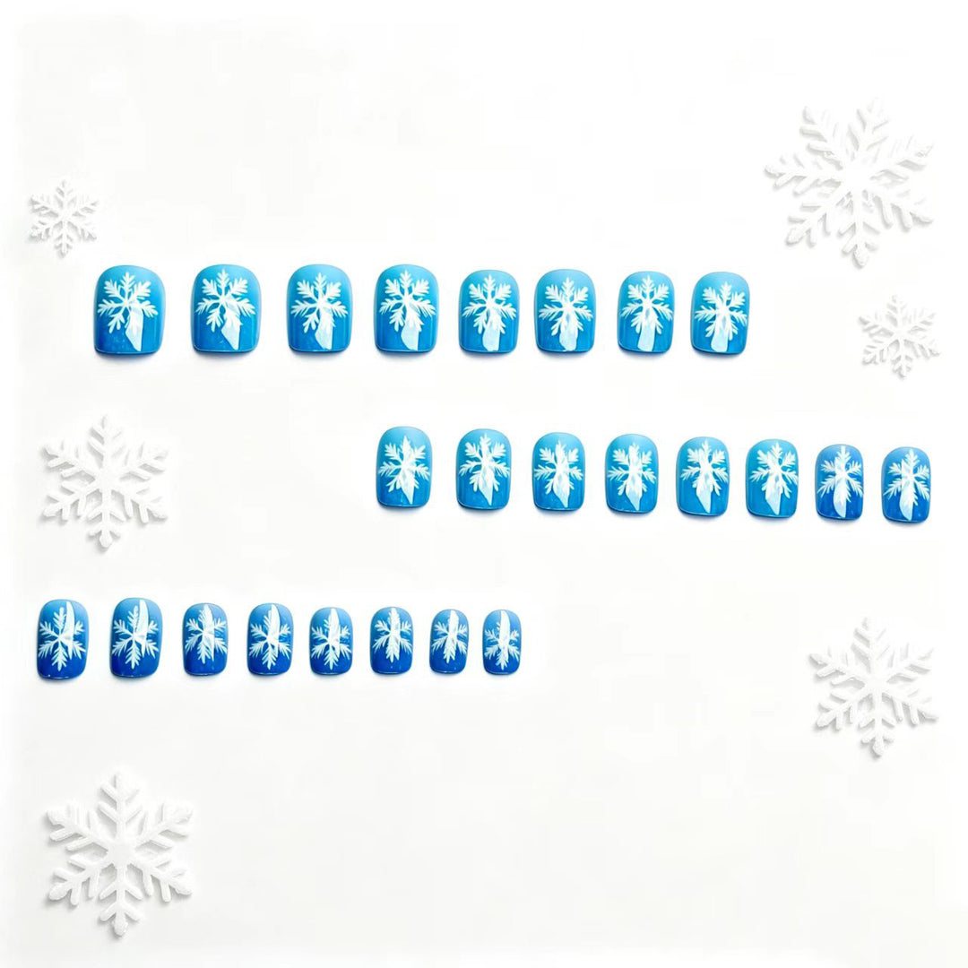 Artificial nails with sparkling winter flake design Bowlift
