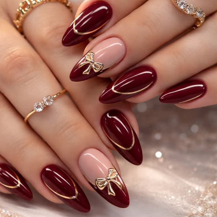 Elegant Stiletto Nail Art Extensions with Gold Accents Bowlift
