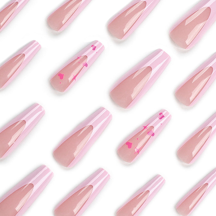 Artful Nail Extensions with Heart-Shaped Accents Bowlift