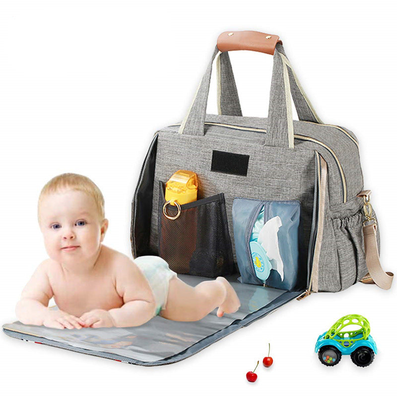 Ladies diaper bag with integrated changing mat Bowlift