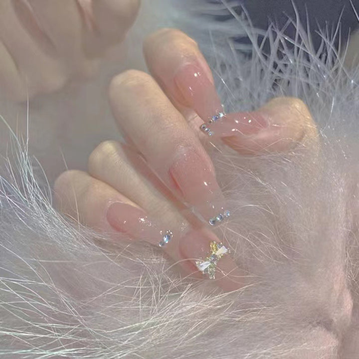 Artificial nails with elegant rhinestone embellishments Bowlift