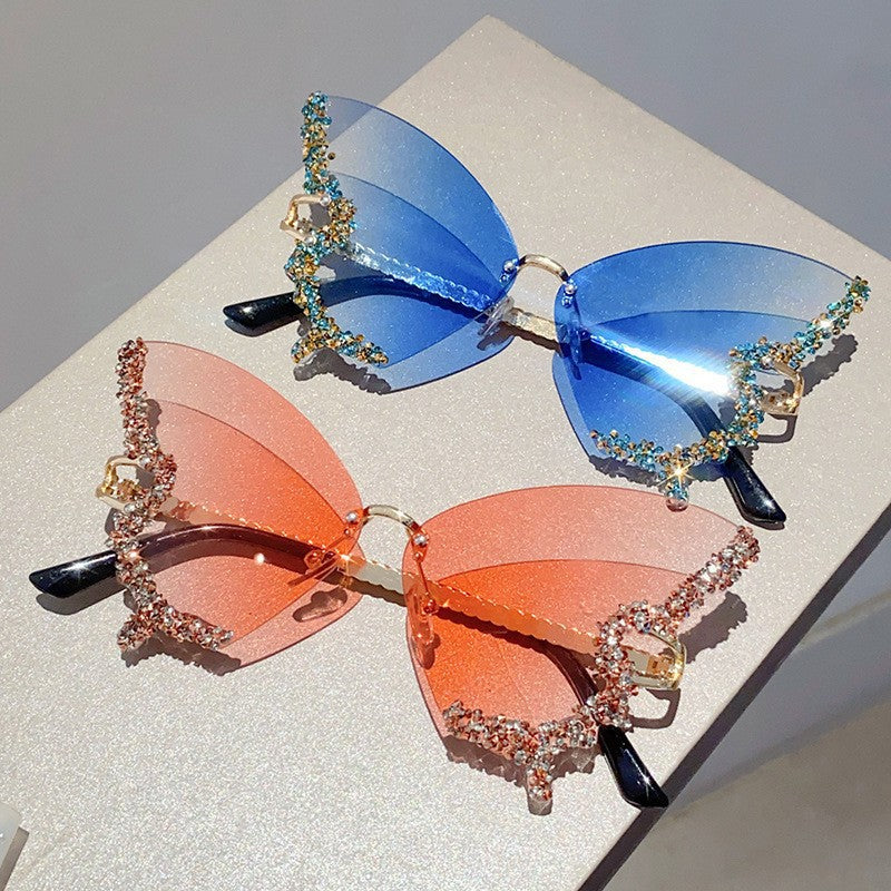 Women's extravagant sunglasses with sparkling butterfly design Bowlift