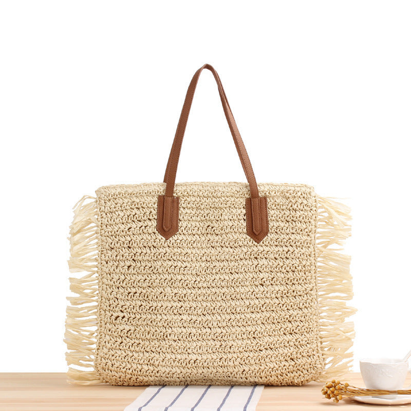 Beach bag with fringes and sturdy leather handles Bowlift