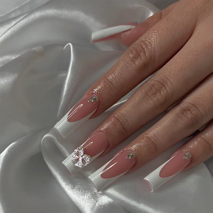Artificial nails with rhinestone details Bowlift
