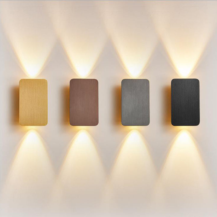Modern rectangular LED wall sconce with dual up down beam and slim low-profile housing Bowlift