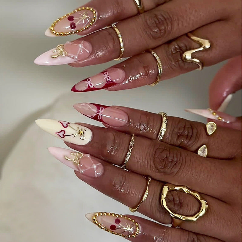 Creative nail art set with playful heart and bow accents Bowlift