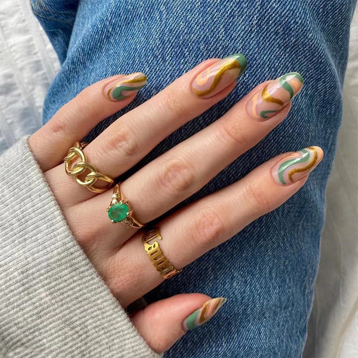 Artful nail extensions with an elegant leaf pattern Bowlift