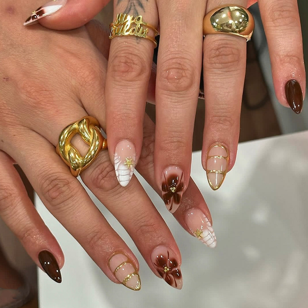 Artful nail art with glamorous accents and elegant embellishments Bowlift