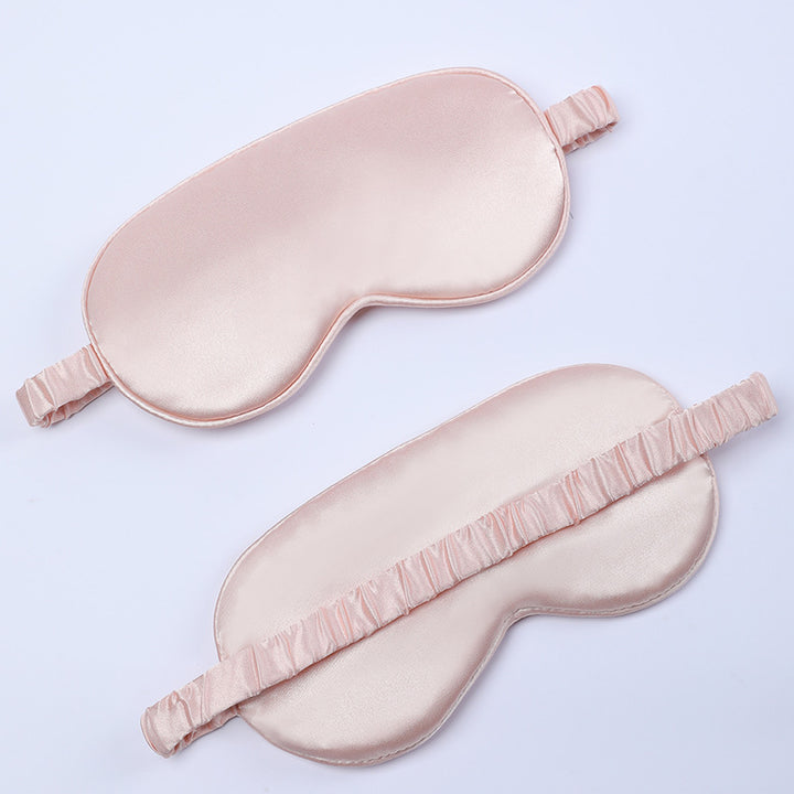 Women's nano silk sleep mask with padded eye area, adjustable elastic band, and storage pouch Bowlift