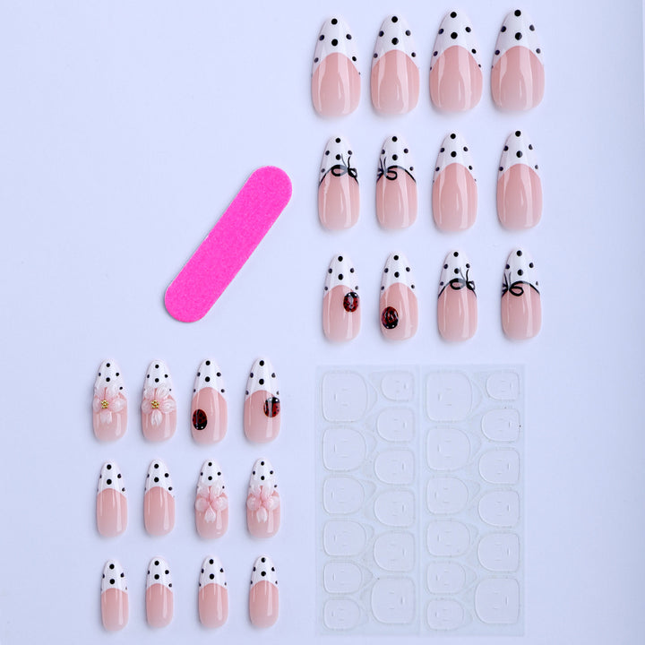 Artificial nail art with floral and playful accents Bowlift