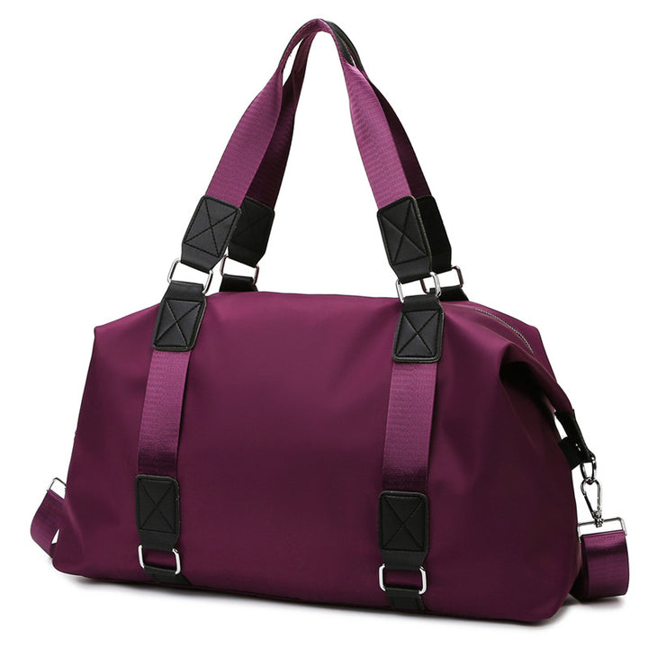 Sports bag with ergonomic carrying handles and versatile interior Bowlift