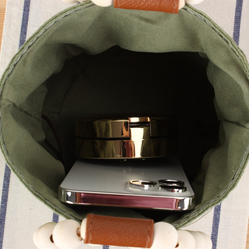 Handbag Made of High-Quality Woven Natural Material with Innovative Closure Bowlift