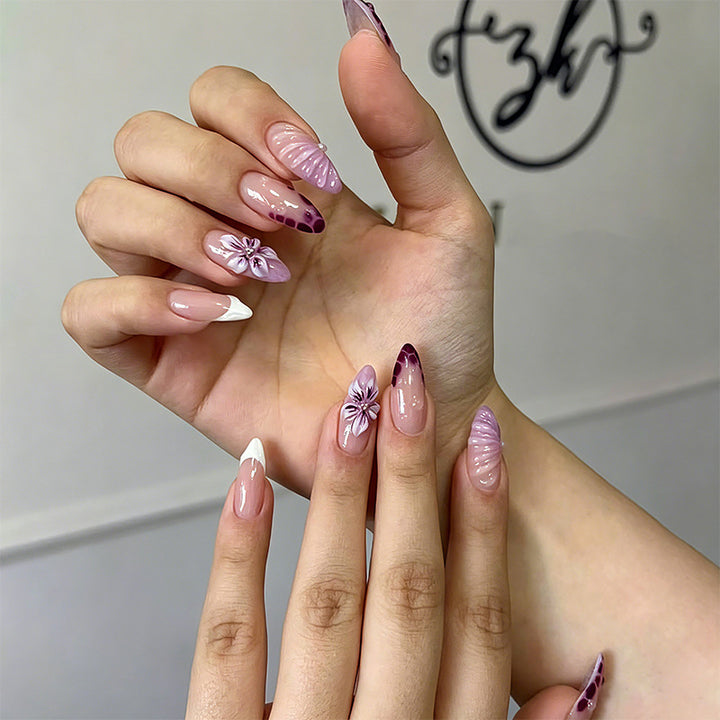 Artificial nails with elegant ombre effects and floral accents Bowlift