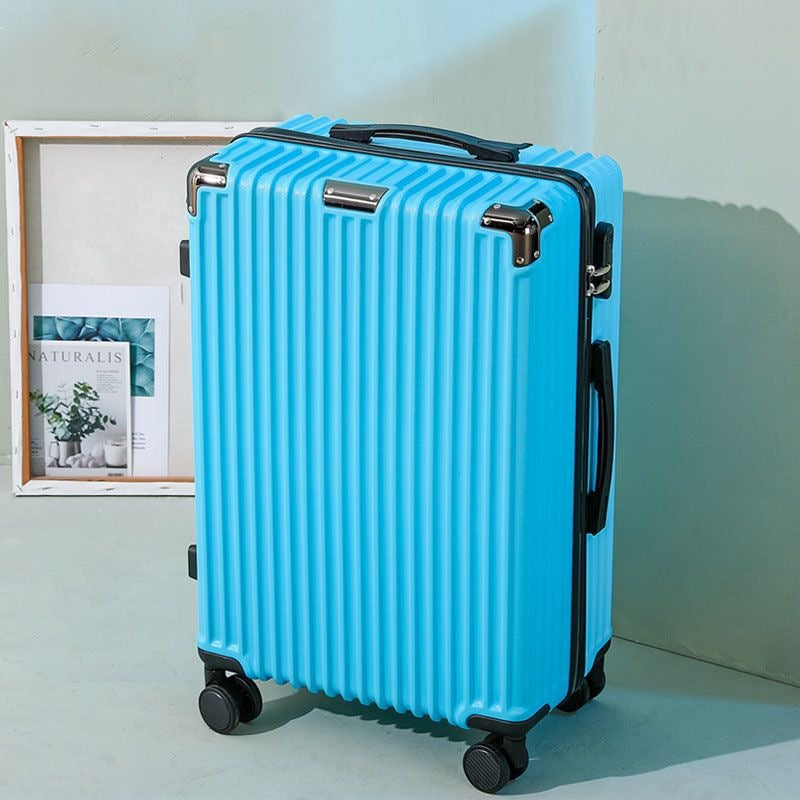 Hard shell suitcase with 360-degree wheel system and integrated safety feature Bowlift