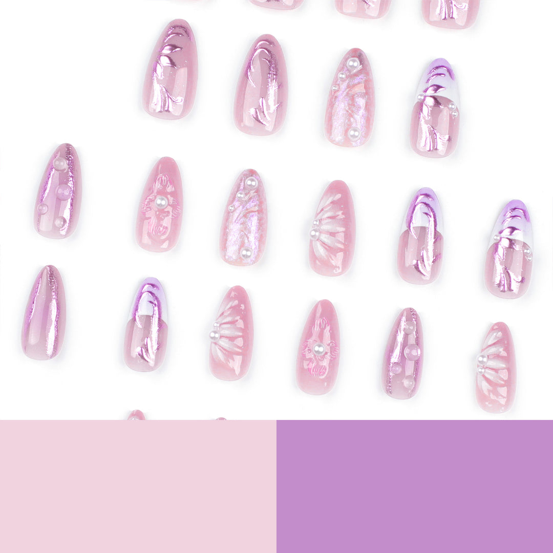 Artificial nail extensions with delicate floral designs and glitter accents Bowlift