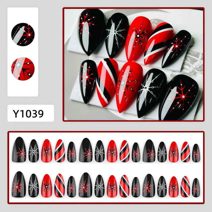 Artificial nails in modern stiletto design with graphic accents Bowlift