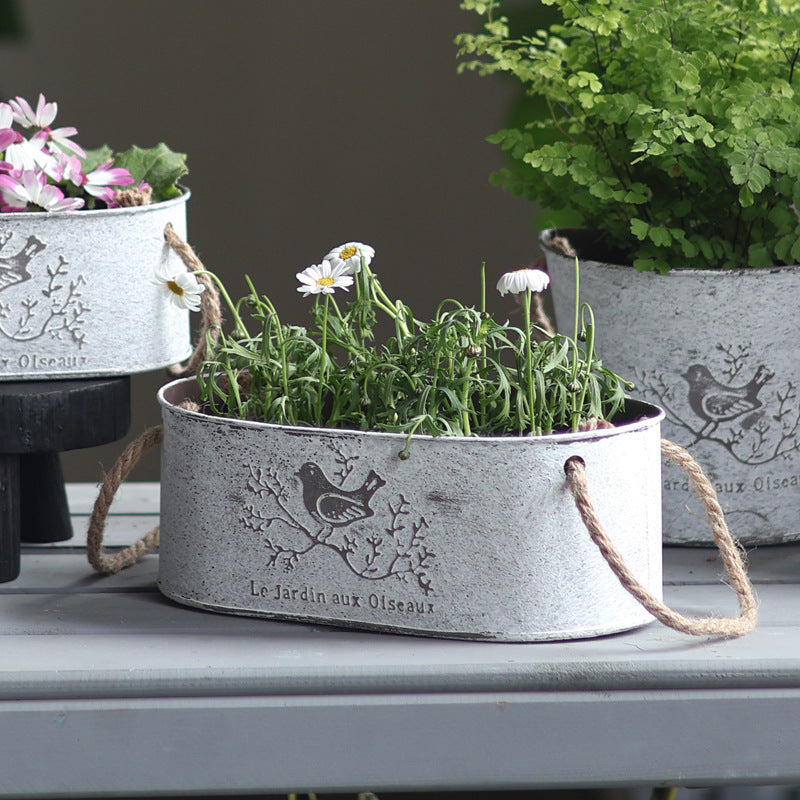 Decorative storage basket made of metal with natural design Bowlift