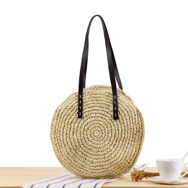 Round basket bag with sturdy leather handles Bowlift