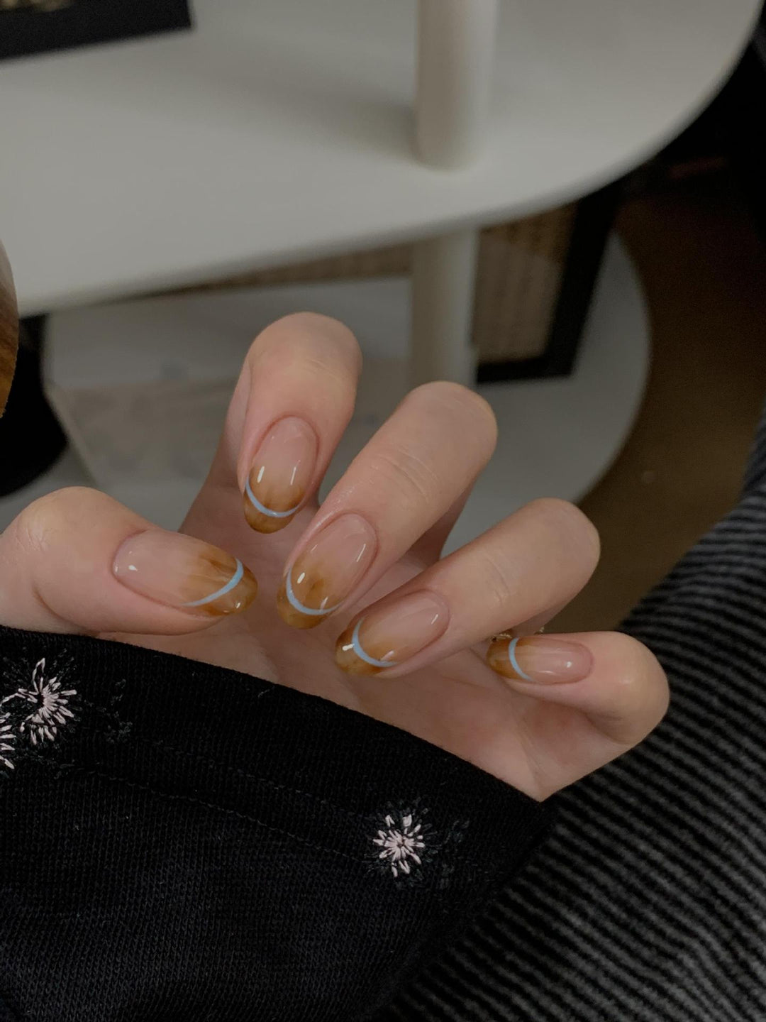 Artificial nails with modern French manicure design Bowlift