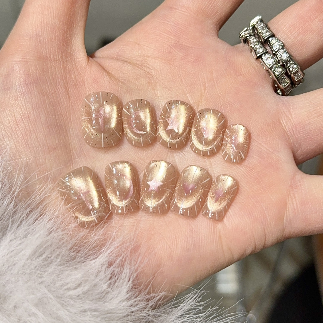 Shiny artificial nail tips with romantic shimmer Bowlift