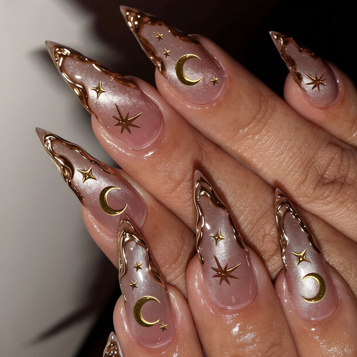 Artistic Stiletto Nail Art Tips with Celestial Accents Bowlift
