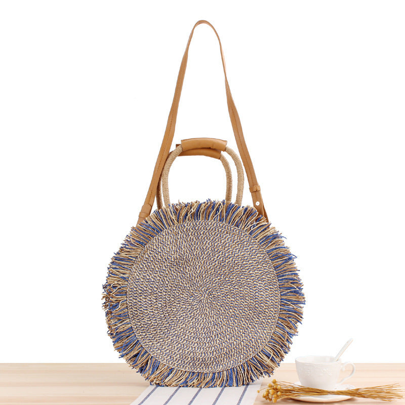 Round Bast shoulder bag with fringes and leather handles Bowlift