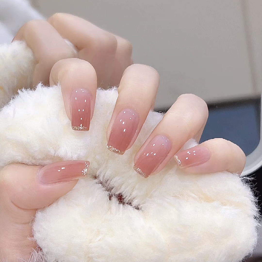 Glamorous artificial nails with delicate flower and glitter effects Bowlift