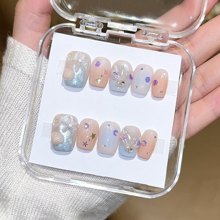 Artificial nails with sparkling galaxy design Bowlift