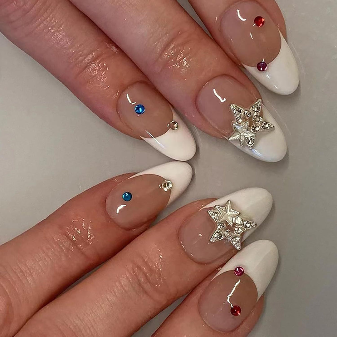 Artificial nail set with elegant French tips and sparkling accents Bowlift