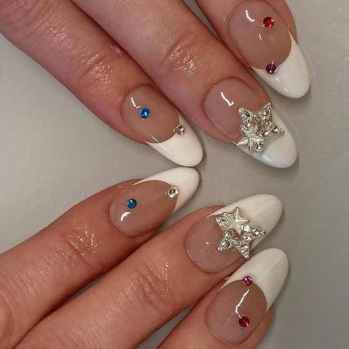 Artificial nail set with elegant French tips and sparkling accents Bowlift
