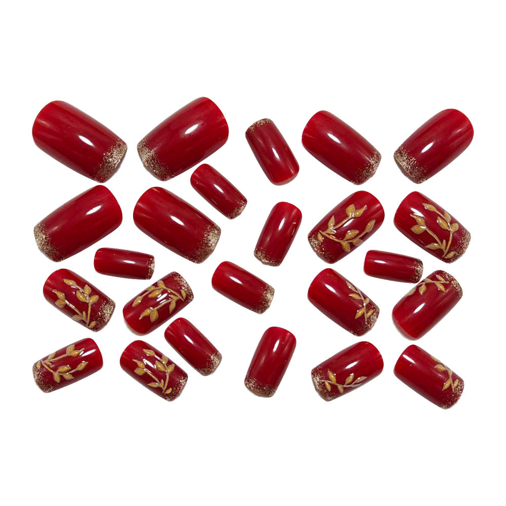 Artificial nails with golden leaf patterns Bowlift