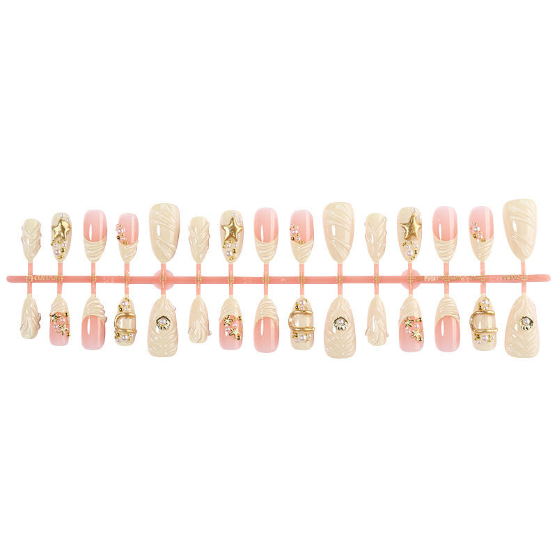Artificial nail set with glamorous gold accents Bowlift