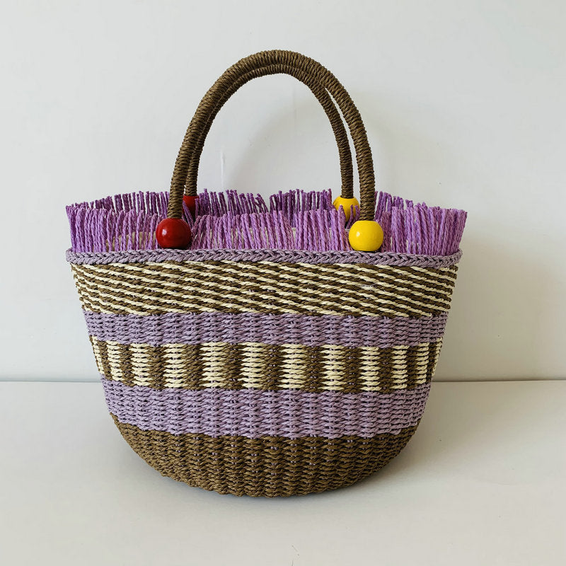 Generous braided tote bag with colorful fringed edge Bowlift