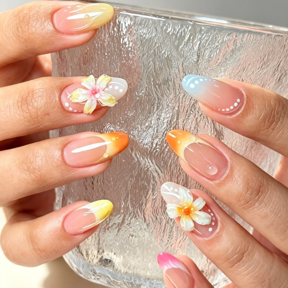 Artificial nails with color accents and floral design Bowlift