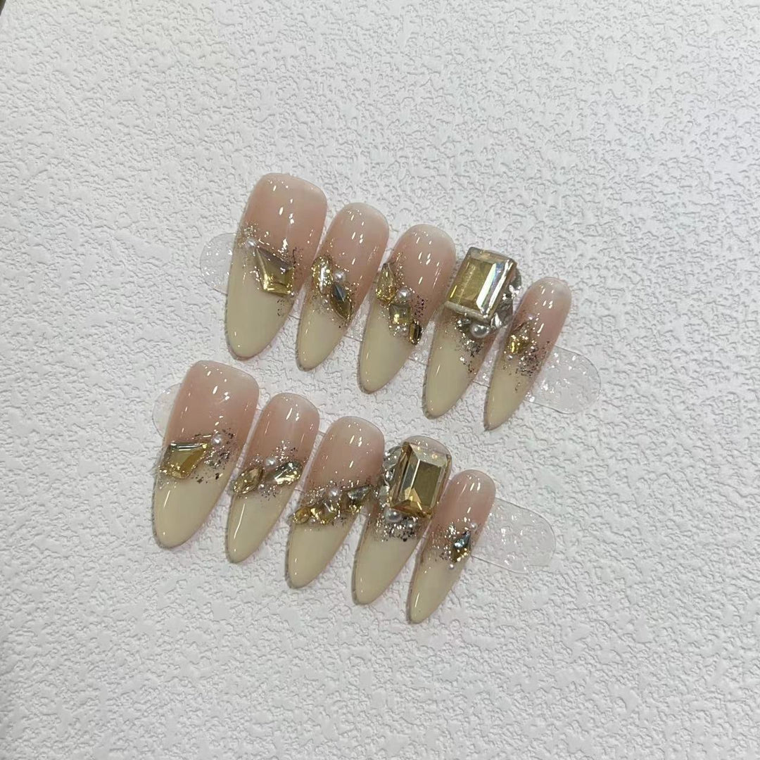 Glamorous Stiletto Press-On Nail Set with Metallic Accents Bowlift