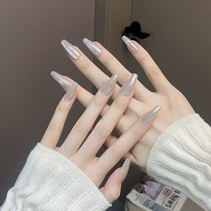 Glossy Nail Art Set with Sparkling Glitter Accents Bowlift