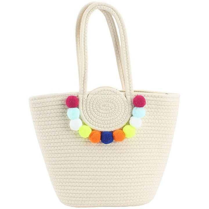 Beach bag with cheerful pom poms Bowlift