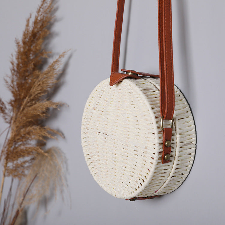 Round basket bag with leather accents Bowlift