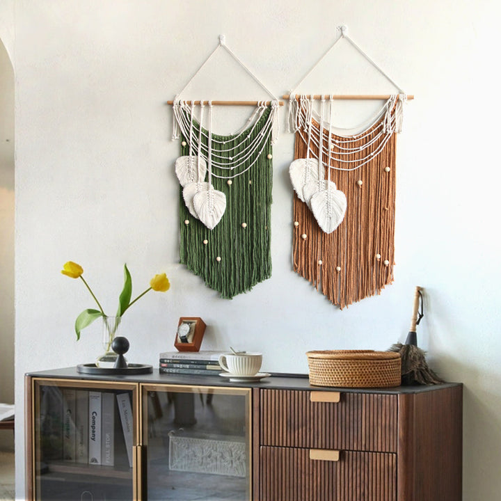 Artistic wall hanging made of macrame with hearts