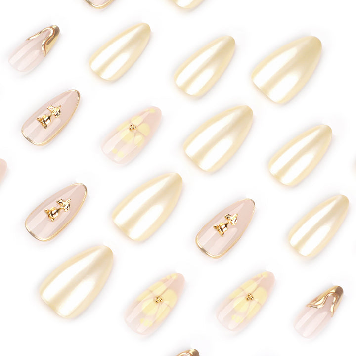 Artful nail art with floral decorations and glitter accents Bowlift