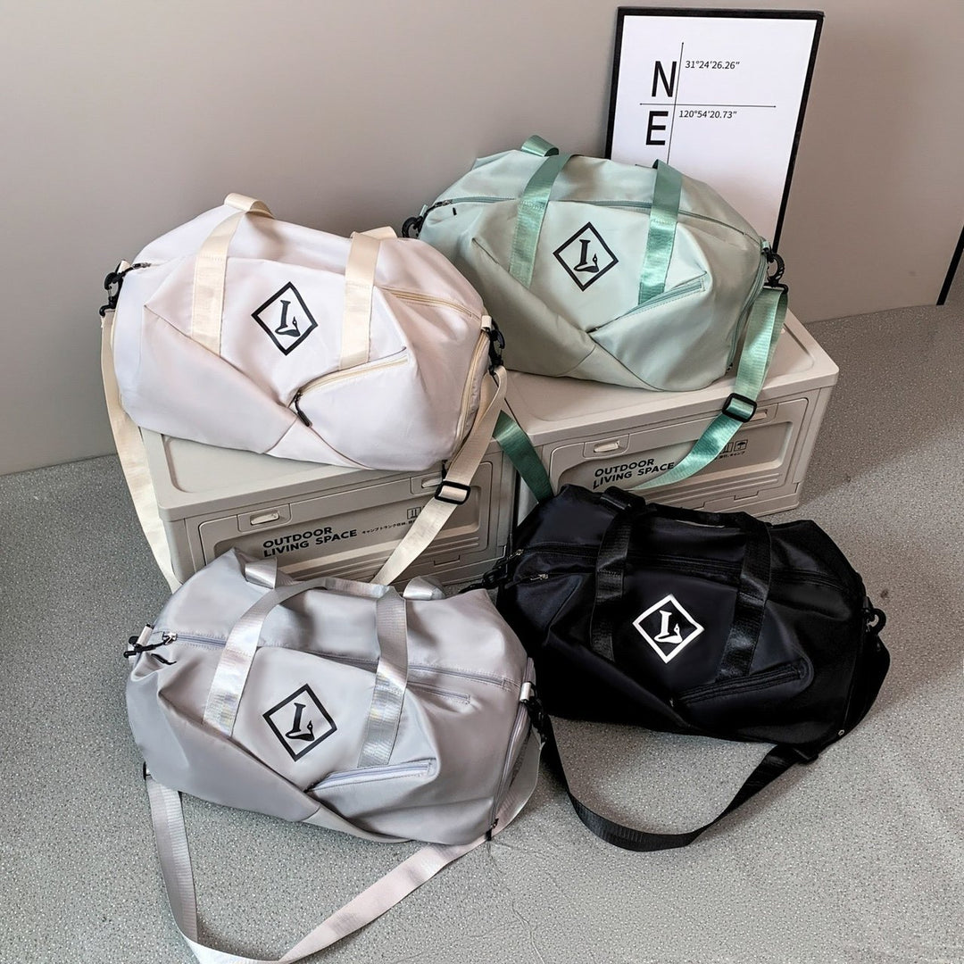 Sporty travel bag with side compartments Bowlift