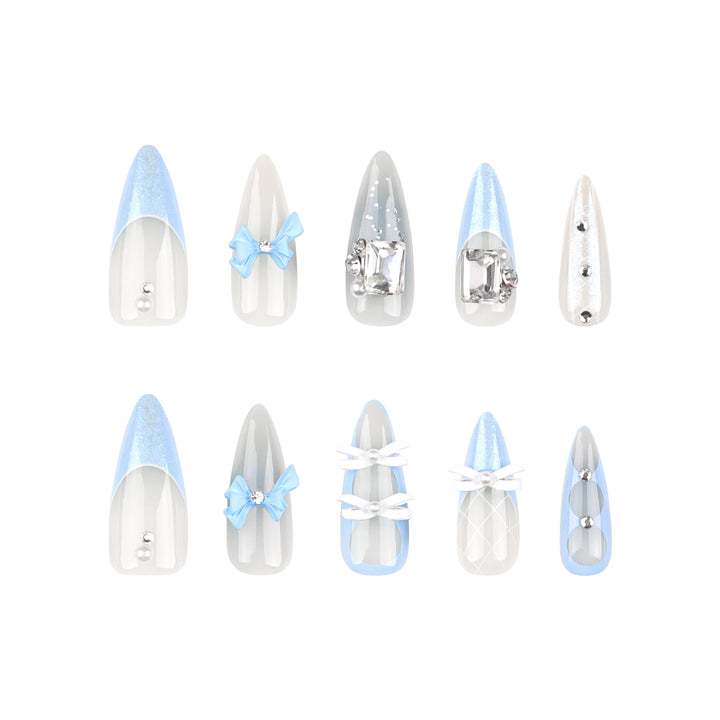 Artistic stiletto nails with elegant jewelry accents Bowlift