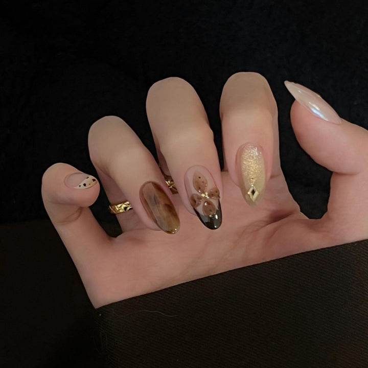 Artificial Nails in Elegant Pastel Look with Floral Accents Bowlift