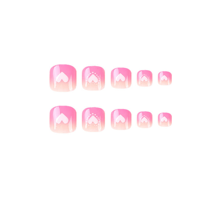 Artful toenail design with heart motifs Bowlift