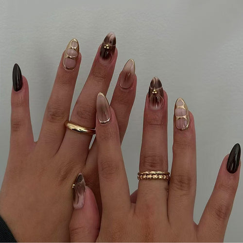 Artificial nail set with elegant ombre design and gold embellishments Bowlift