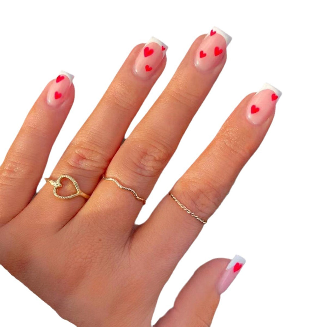 Heart-Embellished French Tip Nail Art Bowlift