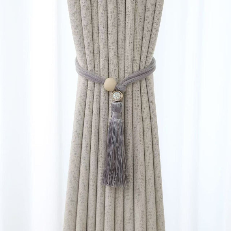 Elegant curtain tieback with tassels Bowlift