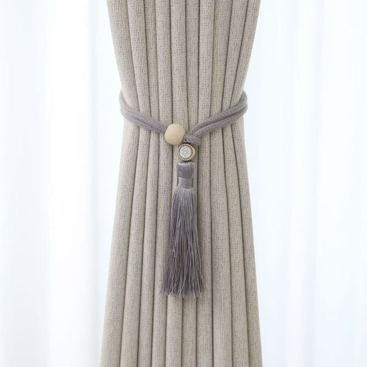 Elegant curtain tieback with tassels Bowlift